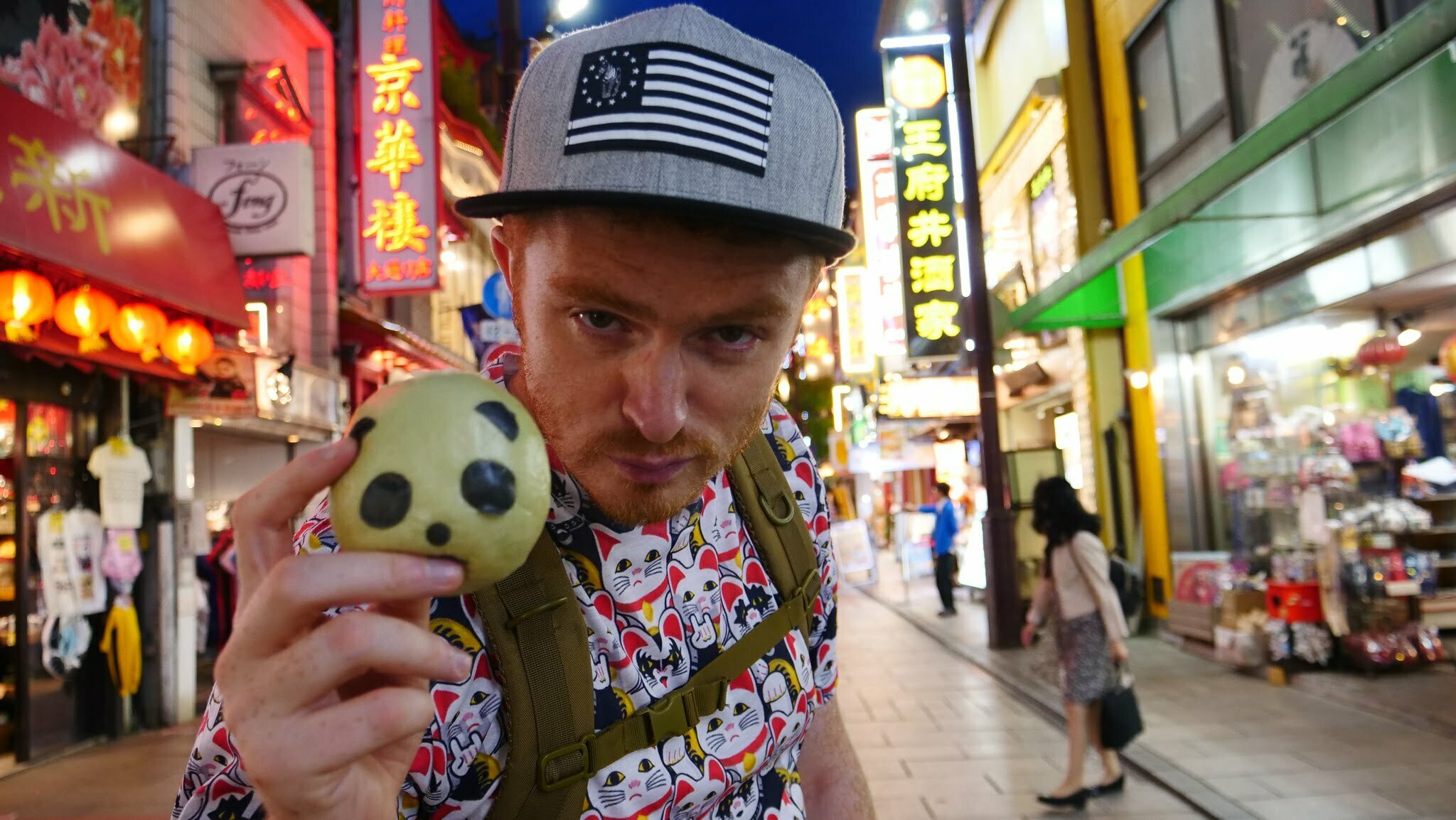 Nomadic Samuel in Tokyo, Japan eating Street Food at night