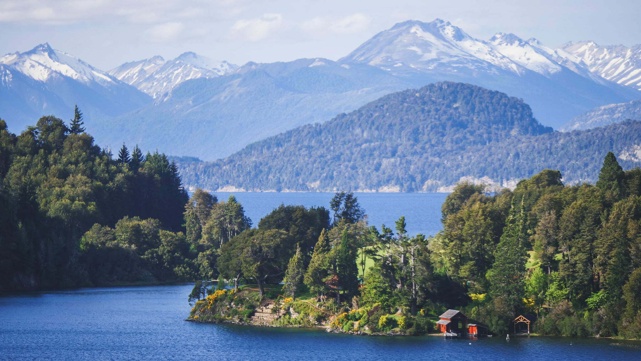 Stunning lake in Bariloche, Argentina with a snow-capped mountain backdrop (Photo by Nomadic Samuel)