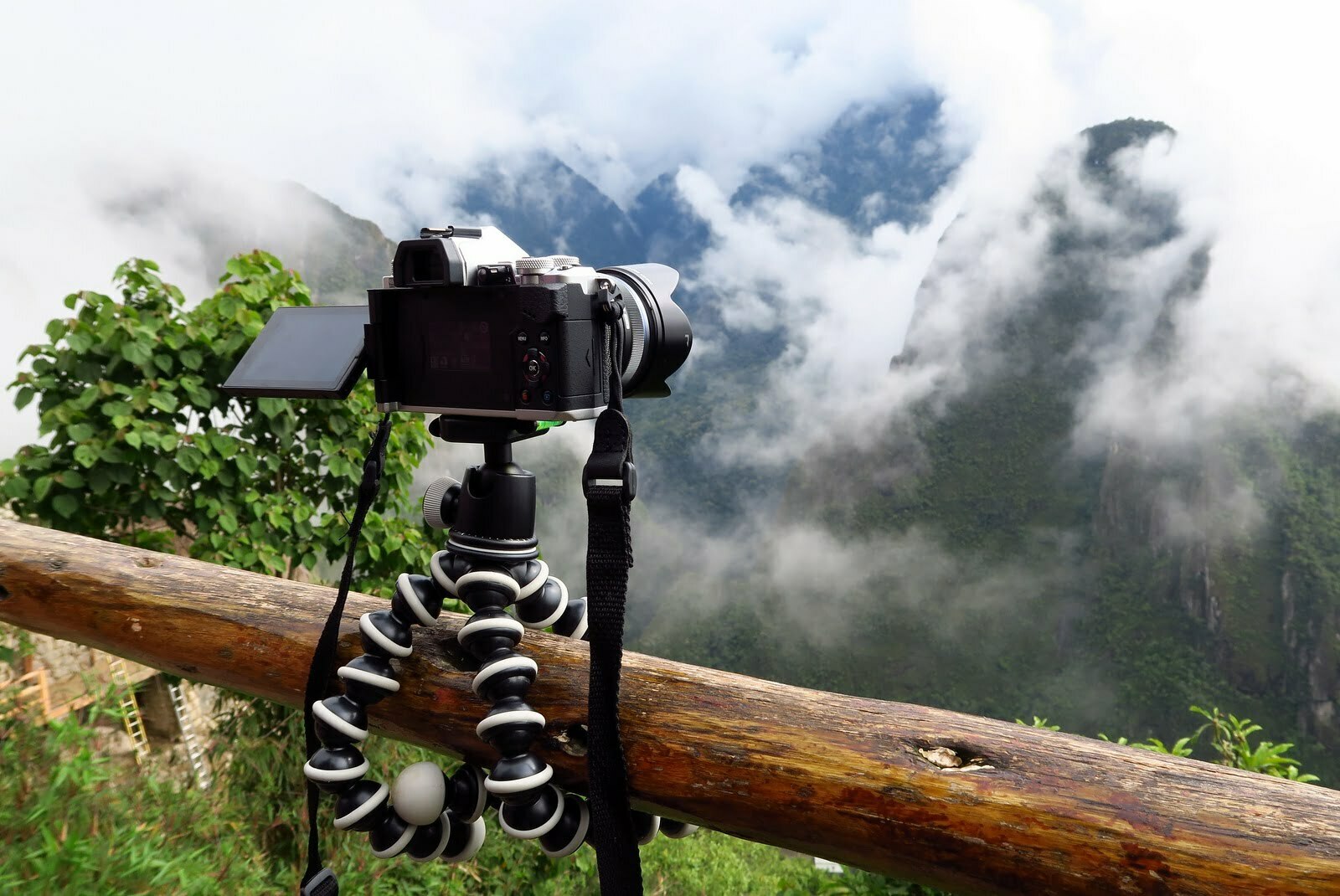 Minimum Volatility Factor Strategies | Low Volatility as the Best Equity Factor with Gorilla pod holding a camera while taking photos of Machu Picchu Peru