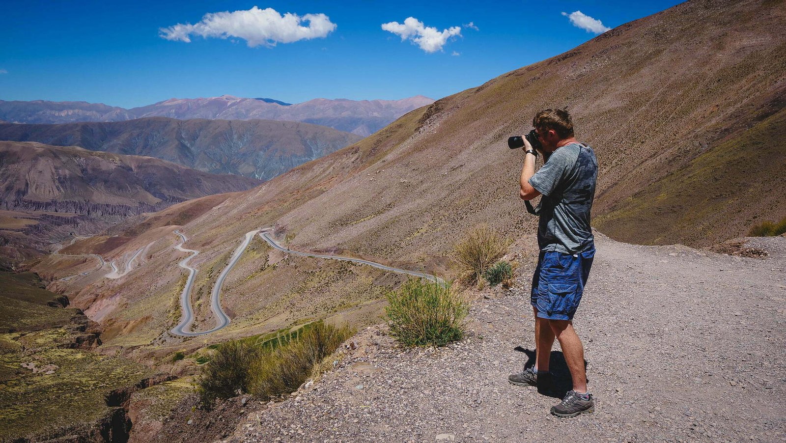 Nomadic Samuel capturing the scenic serpentine road while visiting remote Northern Argentina.