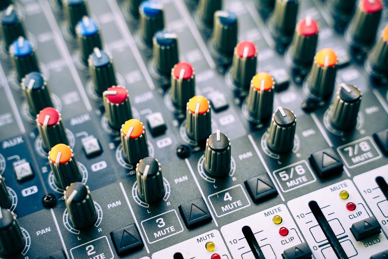 DJ mixer of different buttons representing different styles of investing portfolios