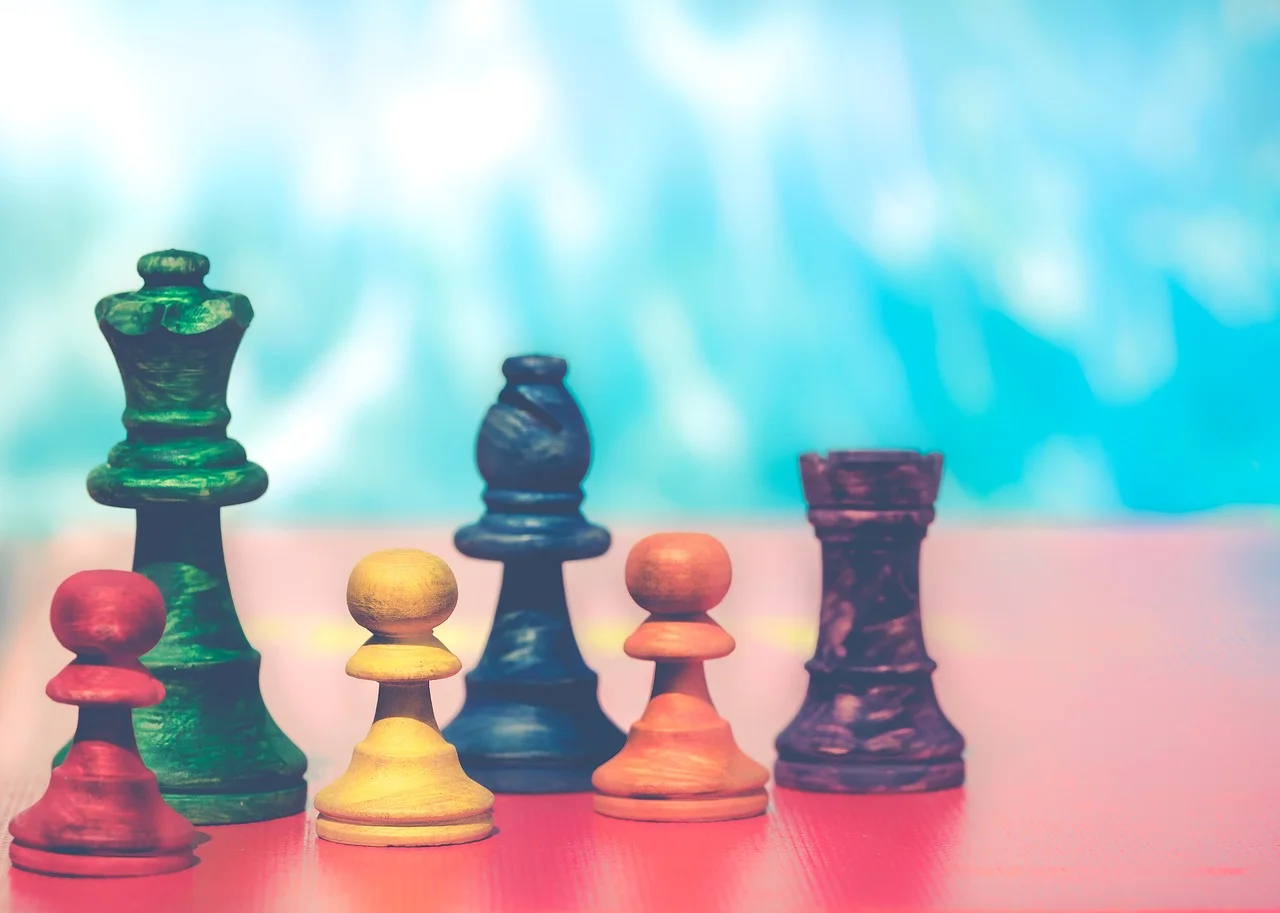 Tom Kasperski's Tactical Asset Allocation Strategy: Brave New World Offensive and Defensive Systematic Investing represented by colourful chess board 