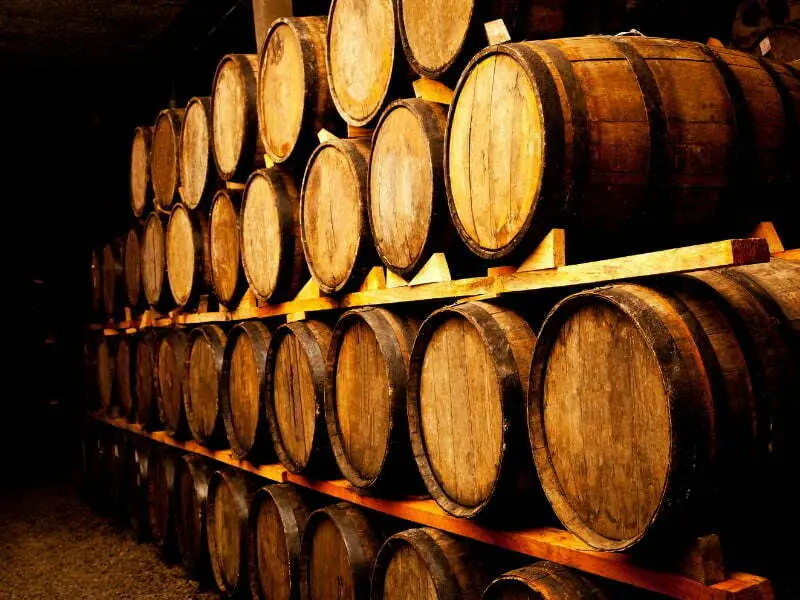Wine barrels in storage as an alternative investment for investors to consider 