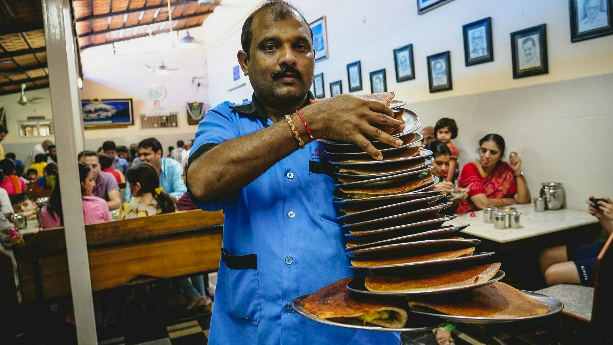 Return stacking dosas for breakfast in Bangalore, India