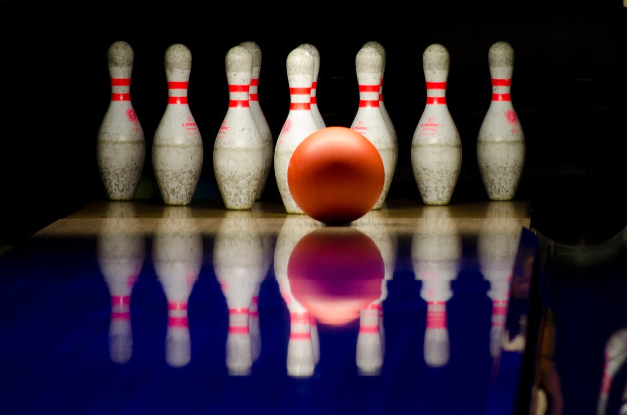 QMOM ETF Review of the strategy behind the fund Alpha Architect U.S. Quantitative Momentum ETF with Ryan Patrick Kirlin bowling ball and pins